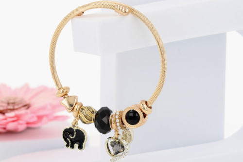 Bransoletka damska złota z czarnymi zawieszkami – słonik i serduszko z kryształka, stal chirurgiczna 316L